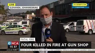 Four killed in fire at gun shop
