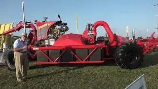 Stu Ellis Looks Over New Farm Equipment