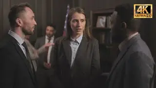 4K Stock Video: Lawyers or Diplomats in Strategic Discussion at High-Level Office