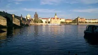 Prague 2017. Vltava ships and the Charles Bridge in the late afternoon.