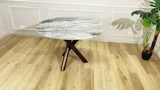 TABLE INTRECCIO extensible avec plateau rond en c&eacute;ramique effet marbre et base en m&eacute;tal tress&eacute;