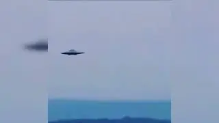Silver Flying Saucer Releases a UFO Orb And It's All Caught On Camera