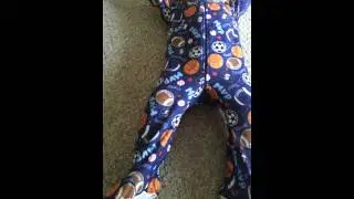 He does not like his feetie pajamas ;/
