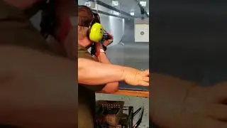 Shooting a Sten machine gun at Drive A Tank.