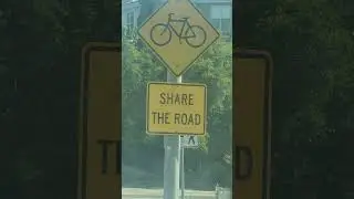 Share the road sign