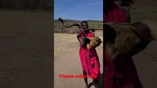 Blowing the horn. ancient mode of communication. #maasai #shorts