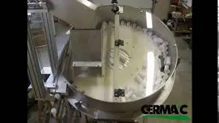 distribution de flacons par un bol &agrave; empreintes
