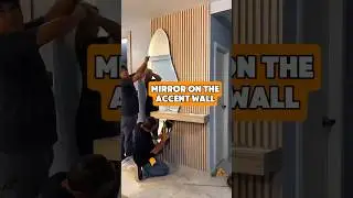 Transforming a Corridor: Slat Wall Panel & Curved Mirror Installation! 🛠️✨ #HomeImprovement