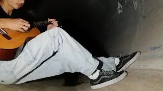 Interstellar theme acoustic guitar played in a tunnel