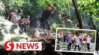 Trekkers spruce up trail of Penang hills