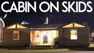 SMALL MOBILE CABIN ON SKIDS WITH BUILT-IN PORCH