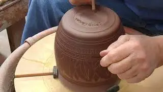 THROWN CLAY VASE BASE TRIMMED USING A GRIFFIN GRIP