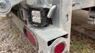 Factory-like, remotely controlled, floodlights for nighttime use of my mini excavator dump trailer