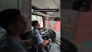 Um carro na esquerda e um &ocirc;nibus na direita sem espa&ccedil;o pra abrir a curva