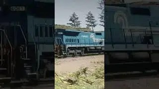 NKP 759 keads a passnger train with a conrail c40-8