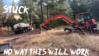 Recovering a Stuck water truck from the DITCH