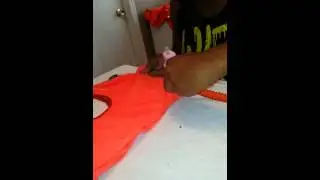 Kentrell making a uniform for Prancing Elites