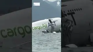Two dead after cargo plane slides off runway in Hong Kong