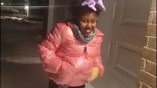 Kids play in the snow outside 
