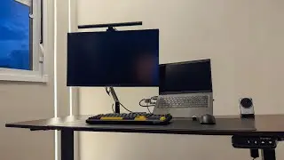 Perfect cable management in my cousin's minimalist laptop setup (it looks amazing).