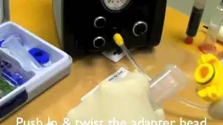 Adhesive Dispensing Ltd - Using a syringe barrel adapter assembly with a pneumatic dispenser