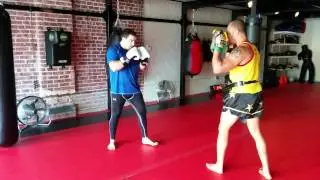 Split entry boxing focus mitt work with Ajarn Buck Grant