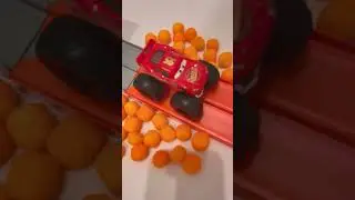 LIGHTNING McQUEEN Monster Truck CHEESE BALL CRASH Landing Stunt on Hot Wheels Track #shorts