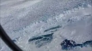 largest aerial view of World's fastest glacier, calving enormous iceberg