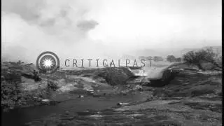 Reenactment depicts a smoke column rising from planted explosions over a bridge i...HD Stock Footage