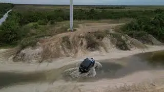 Getting muddy at the Palm Bay Compound