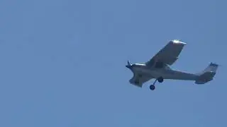 Cessna 150 towing the banner with advertisement &ldquo;Truly Hard Seltzer&rdquo; flyover 8/30/2019