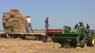 Aves Farms - Baling and Stacking Straw on 7-12-2013