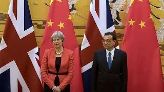 May talks about Brexit impact on UK, the rest of the world