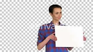 Attractive Woman shows blank white poster, Alpha Channel | Stock Footage - Videohive