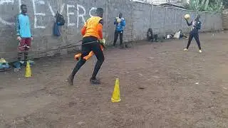 Goalkeepers Working on strength using an improvised resistance belt / Kariobangi Goalkeepers Drills