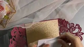 burgundy laser cut wrap with classic invitation