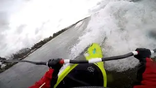 Backsurfing lake waves