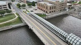 4K drone footage of Downtown Waterloo Iowa, Cedar river, bridges, Waterloo Center for the Arts