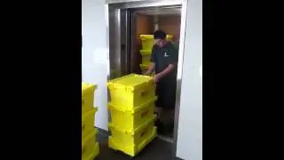 Denver Office Move | Loading Office Equipment into Elevator