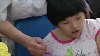 US war veterans tour Agent Orange victims center in Vietnam
