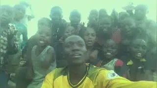 young giftinho passing evening with his young fans in kasese district