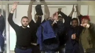 Greek prison hostage drama: murderer 'has explosives'