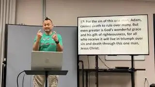 Long Duong signs Romans 5:16-18