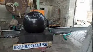 Granite Ball Fountain floats on plinth
