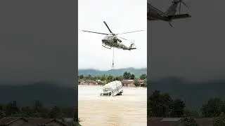 &ldquo;Epic Flood Rescue: Helicopter Lifts Truck Packed with Rice from Raging Waters!&rdquo; #HelicopterLift