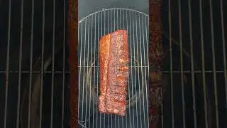 Burn and turn baby backs over direct heat on the Ugly Drum Smoker. #backinthelab #backyardbbq #smoke