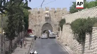 Shrine tensions high, railings and cameras remain