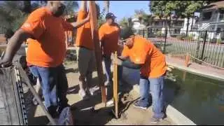 Team Depot volunteers work a landscape makeover at The Hacienda