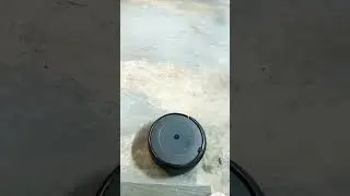 Roomba robot doing the work for me in garage (after manual debris removal) #efficiency #betterlife