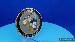 The second version of Official Walt Disney World Security Investigations Challenge Coin.